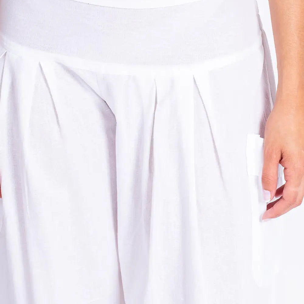 Bijele boho hlače od pamuka s velikim bočnim džepovima