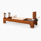 Bodylumina Premium Diamond drveni pilates reformer s bež kliznom platformom, podesivim trakama i naslonom za stopala, profesionalna pilates sprava za reformer trening, jačanje core mišića, istezanje i oblikovanje tijela kod kuće ili u studiju.