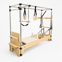 Bodylumina Premium Gold pilates combo reformer s bež tapeciranom platformom, drvenim okvirom, Cadillac konstrukcijom, metalnim tornjem, oprugama, trakama i visećim dodacima, profesionalna pilates sprava za kompletan reformer i Cadillac trening, istezanje, jačanje core mišića, stabilnost i oblikovanje tijela kod kuće ili u studiju.